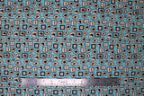 Flat swatch Gallery Wall fabric (light blue striped fabric with packed picture frames allover in square and oval/circular shapes with human and insect silhouettes inside)