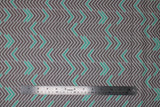Flat swatch Chevron fabric (white fabric with busy grey chevron pattern allover and some mint coloured chevron arrows)