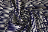Swirled swatch Tassels Black fabric (black fabric with gold metallic/shimmer effect speed look lines in vertical stripes allover)
