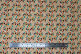Flat swatch Vines fabric (pale peach pink fabric with thin peach swirly vines allover with multi-coloured leaves in white, grey, navy, peach, orange, blue, green)