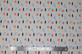 Flat swatch licensed DC Comics printed fabric in Retro Logos (small assorted DC heros logos on white)