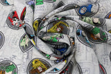 Swirled swatch DC Comic Villians printed fabric (on white)