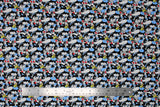 Flat swatch Sylvester & Tweety fabric (blue fabric with busy repeated pattern of sylvester the cat with tweety bird)