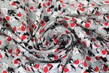 Swirled swatch Sylvester Expressions fabric (grey fabric with collaged sylvester the cat heads)