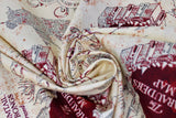 Swirled swatch Marauders Map fabric (beige and burnt orange speckled/distressed look fabric with movie map repeat print)