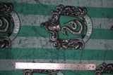 Flat swatch Slytherin fleece (pale light and medium green stripes with house crest and subtle black distressing lines)