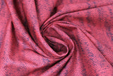 Swirled swatch red knit fabric (red knit look fabric with subtle black accents)