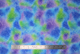 Flat swatch watercolour leaf fabric (light blue, blue, purple, light and dark green marbled/watercolour look fabric with faint white floral and leaves outlines)