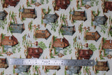 Flat swatch outhouses fabric (white fabric with medium sized assorted wooden outhouses with small patches of greenery around)