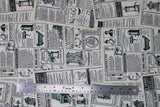 Flat swatch read all about it fabric (off white collaged news paper print fabric with text and vintage look graphics related to bathroom)