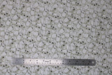 Flat swatch toilet rolls fabric (white fabric with small tossed toilet paper rolls all over)