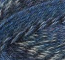 Swatch of Patons Kroy Socks FX Yarn in cadet (medium to dark blues, white and black shades with twists)