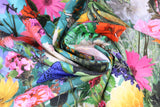 Swirled swatch assorted floral printed fabric in turquoise (pale turquoise fabric with full colour wild flowers scene in various styles/colours with butterflies)