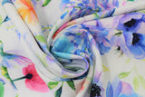 Swirled swatch hummingbird fabric (white fabric with tossed pink, orange, blue, purple florals with greenery and tossed blue/green hummingbirds)