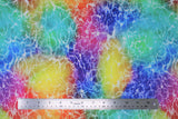 Flat swatch radical rainbow fabric in water (bright rainbow watercoloured fabric with white wavy water texture/lines)
