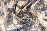 Swirled swatch cream fabric (thick cream coloured rope layered collage)