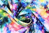 Swirled swatch Spring fabric (white and black floral collaged allover with misty look marbled rainbow overlay)