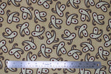 Flat swatch paisley fabric (beige fabric with tiny tossed white floral heads with pink centers, and large tossed white paisley elements with maroon and green outlines, and maroon long stem flowers within)