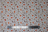 Flat swatch Autumn Treats fabric (white fabric with tossed fall themed coffee treats emblems tossed allover in full colour: lattes, coffee, cinnamon sticks, coffee beans, etc.)