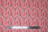 Flat swatch I'd Pause My Video Game For You fabric (pink fabric with lines of video game related emblems: hearts, coins, x's, etc.)