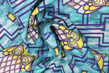 Swirled swatch Owls fabric (blue and teal distressed look fabric with navy geometric line design allover with lime green squares and geometric style owls)