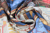 Swirled swatch Blue Stripe fabric (brown and blue coloured horizontal stripes with illustrative style full colour tools within: ladder, drill, hammer, screw drivers, etc.)