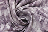Swirled swatch Tire Tracks fabric (grey marbled look fabric with charcoal tire track marks allover)