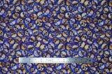 Flat swatch Skulls fabric (purple marbled look fabric with neutral skull heads allover)