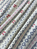 Swirled swatch winter themed flannel in Deer navy stripes (small print Christmas sweater look stripes with red deer pattern on white)