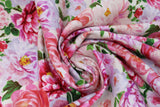 Swirled swatch flower printed fabric in multi (large floral heads and leaves on white)