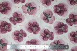 Flat swatch floral printed fabric in rosewood (white fabric with tossed purple floral heads in medium size and colour wisps)