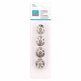 Package of 4 metal sewing machine bobbins (7 hole)