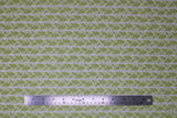 Flat swatch Leafy Green fabric (white fabric with medium thick stripes of green leaves making sideways v shapes)
