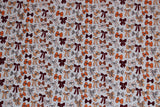 Flat swatch Ribbons and Bows fabric (white fabric with tossed illustrative style bows allover and dots in peach, orange, beige, maroon)