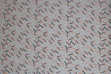 Flat swatch Bobby Pins fabric (white/grey fabric with tossed bobby pins in grey, orange, peach, maroon and black allover)