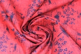 Swirled swatch fabric dragonfly & bee red (red fabric with black bees and dragonflies tossed, "15" text and faded notes looking square shapes with faint writing)