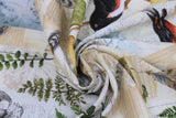 Swirled swatch forest themed fabric in Big Forest Notes (vintage look collage on white with plants, bugs, birds)