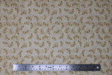 Flat swatch forest themed fabric in Gold Butterflies (small pale gold butterflies on white)