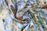 Swirled swatch layered fish fabric (blue water texture background, assorted colourful lake fish layered)