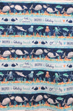 Full swatch whale themed fabric in Whaley Loved Panel 23"x44" (multi blue stripes, whales, and "whaley loved" text)