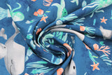 Swirled swatch whale themed fabric in Big Sea Life (assorted large cartoon sea creatures on blue)