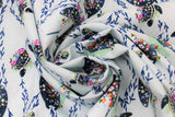 Swirled swatch Floral Turtle fabric (white fabric with tossed turtles with floral shell decorations and tossed seaweed style greenery allover)