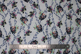 Flat swatch Floral Turtle fabric (white fabric with tossed turtles with floral shell decorations and tossed seaweed style greenery allover)