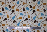 Flat swatch White Toss fabric (white/cream fabric with tossed music instrument silhouettes in black, blue and gold)