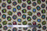 Flat swatch Painted Shells fabric (white fabric with tossed green turtles with painted shells in blue, green, pink and yellow shades)