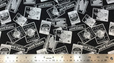 Flat swatch of car service poster signs printed fabric in black (black fabric with white/grey/black rectangle bagdes with white outlines and car emblems/text within in a vintage style)