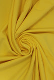Swirled swatch Tricot Lycra solid fabric in yellow