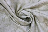 Swirled swatch Algodon Marble fabric in shade natural (white and beige marbled look fabric)