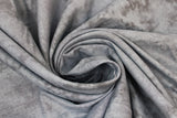 Swirled swatch Algodon Marble fabric in shade dark grey (dark grey and charcoal marbled look fabric)