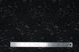 Flat swatch black lace detail fabric